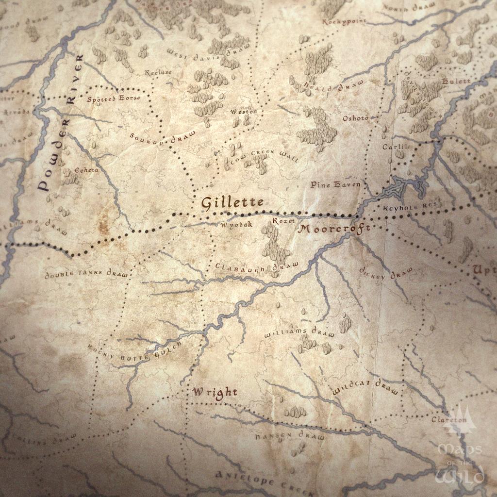 Wyoming wall map done in fantasy art style for home and office decor.