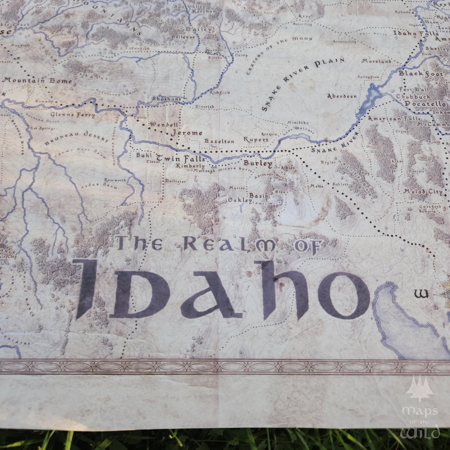 Idaho wall map done in fantasy art style for home and office decor.