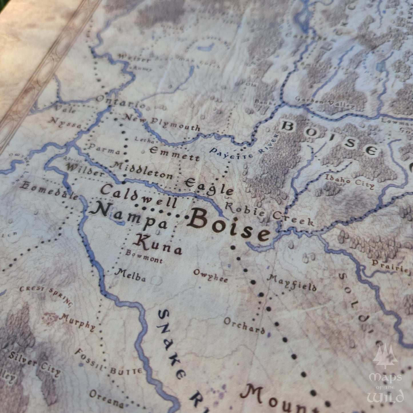 Idaho wall map done in fantasy art style for home and office decor.