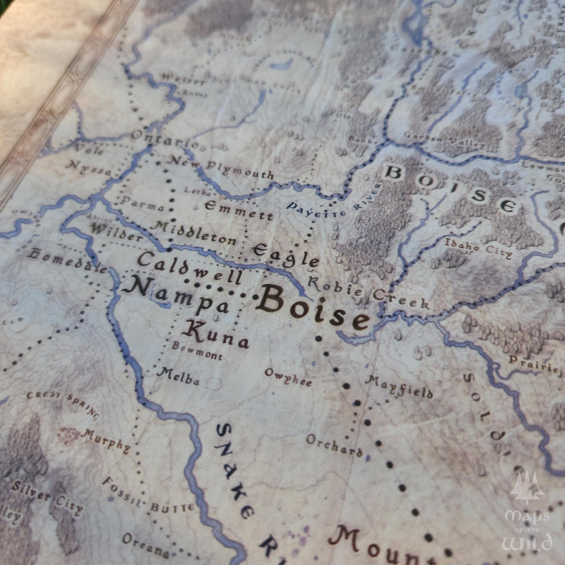 Idaho wall map done in fantasy art style for home and office decor.