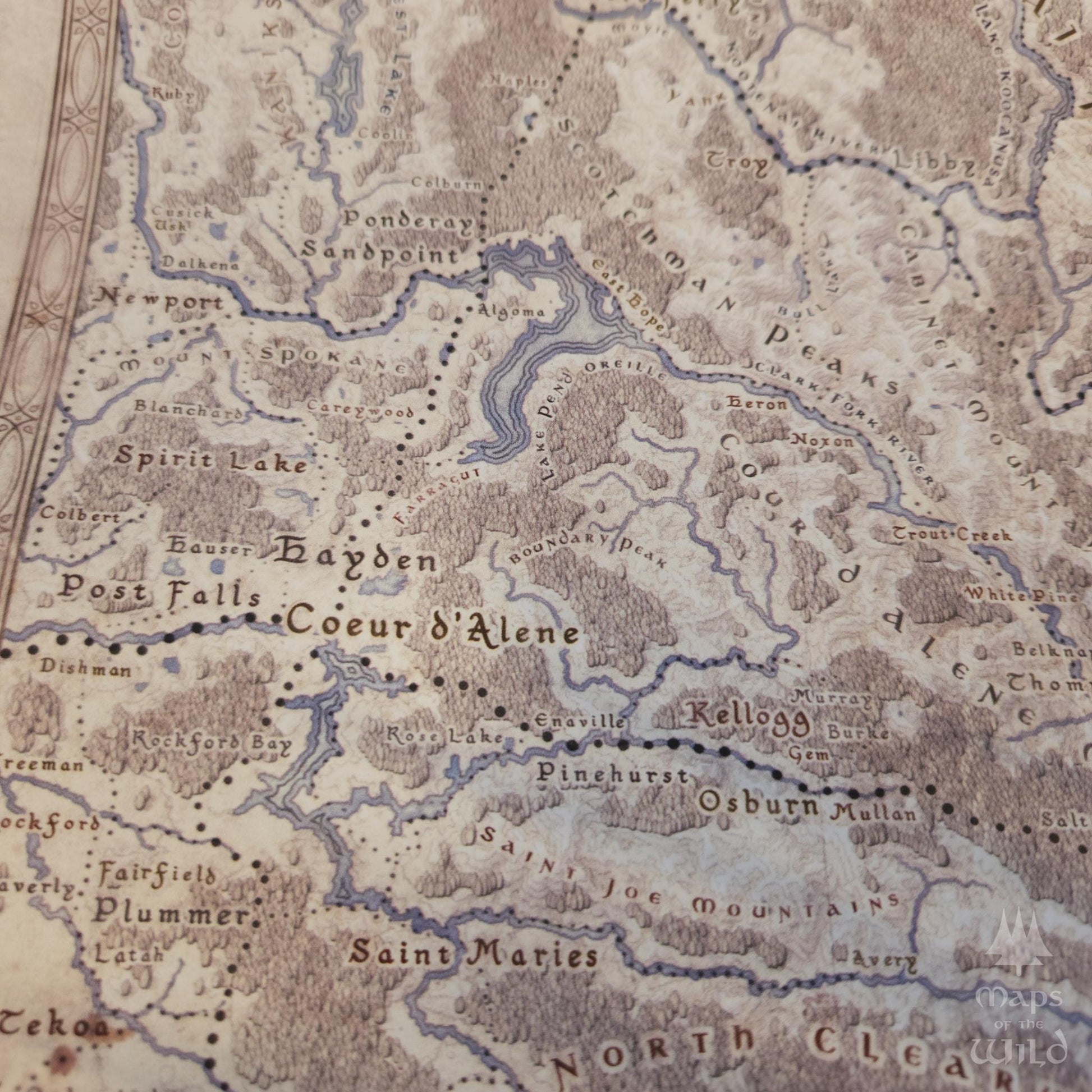 Idaho wall map done in fantasy art style for home and office decor.