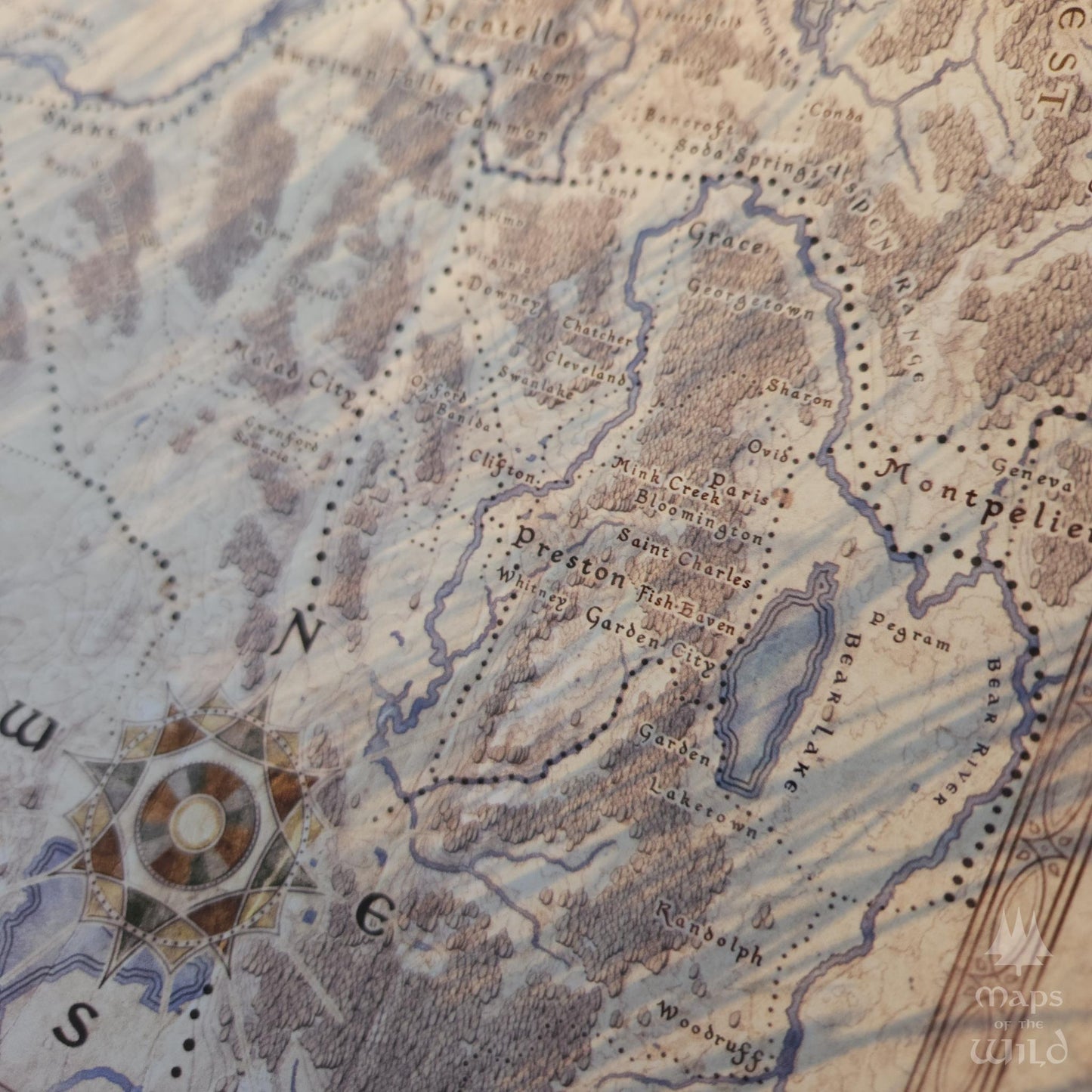 Idaho wall map done in fantasy art style for home and office decor.