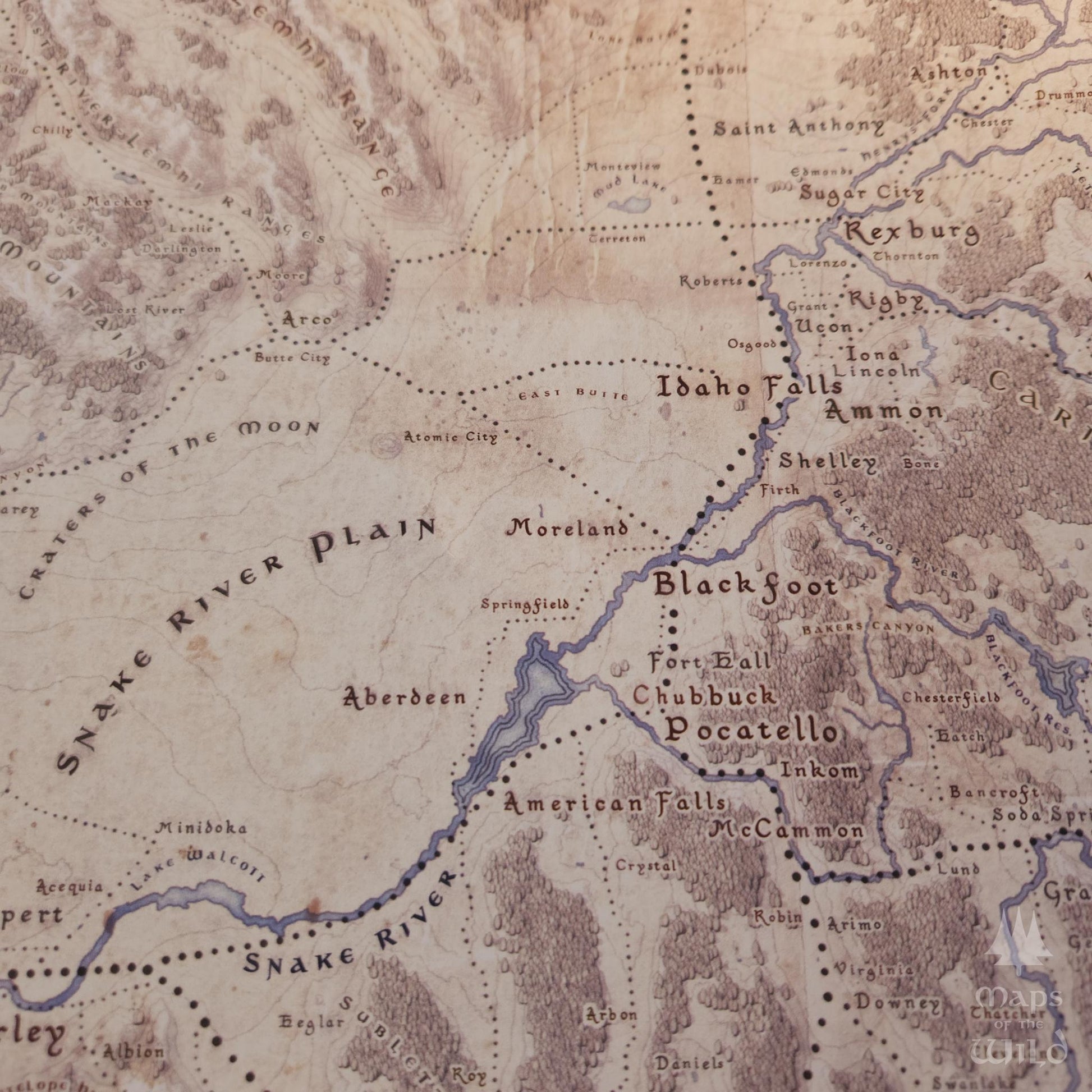 Idaho wall map done in fantasy art style for home and office decor.