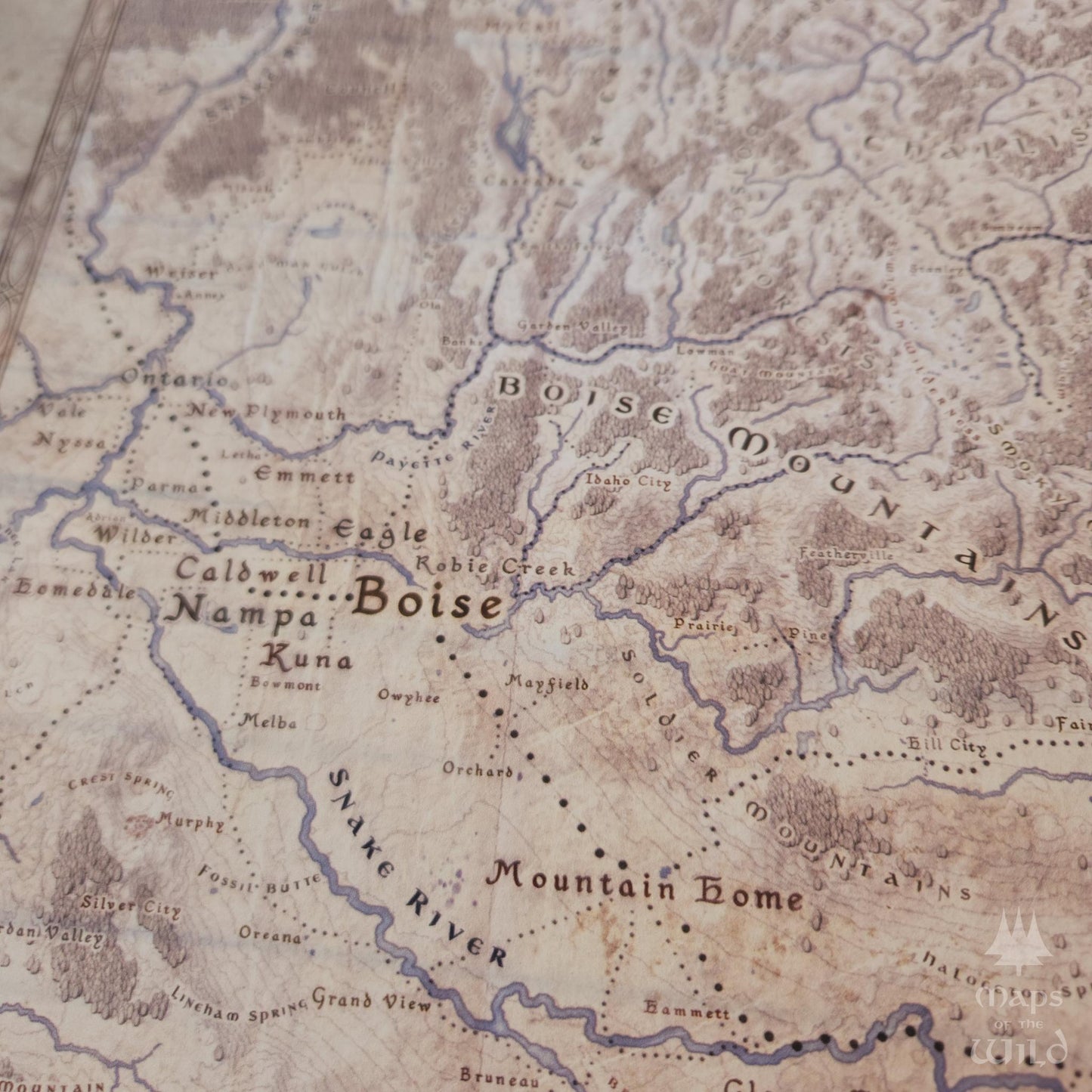 Idaho wall map done in fantasy art style for home and office decor.