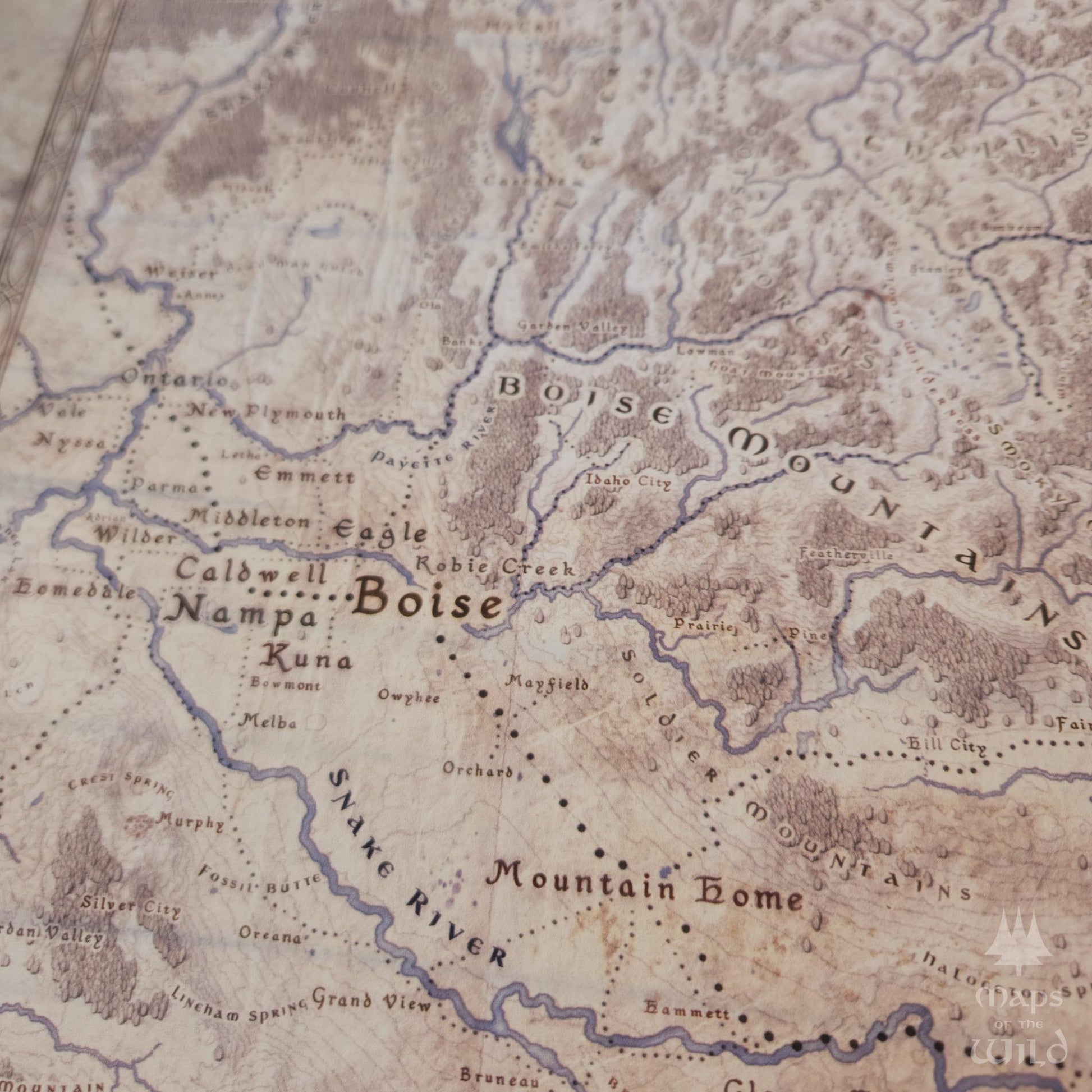 Idaho wall map done in fantasy art style for home and office decor.