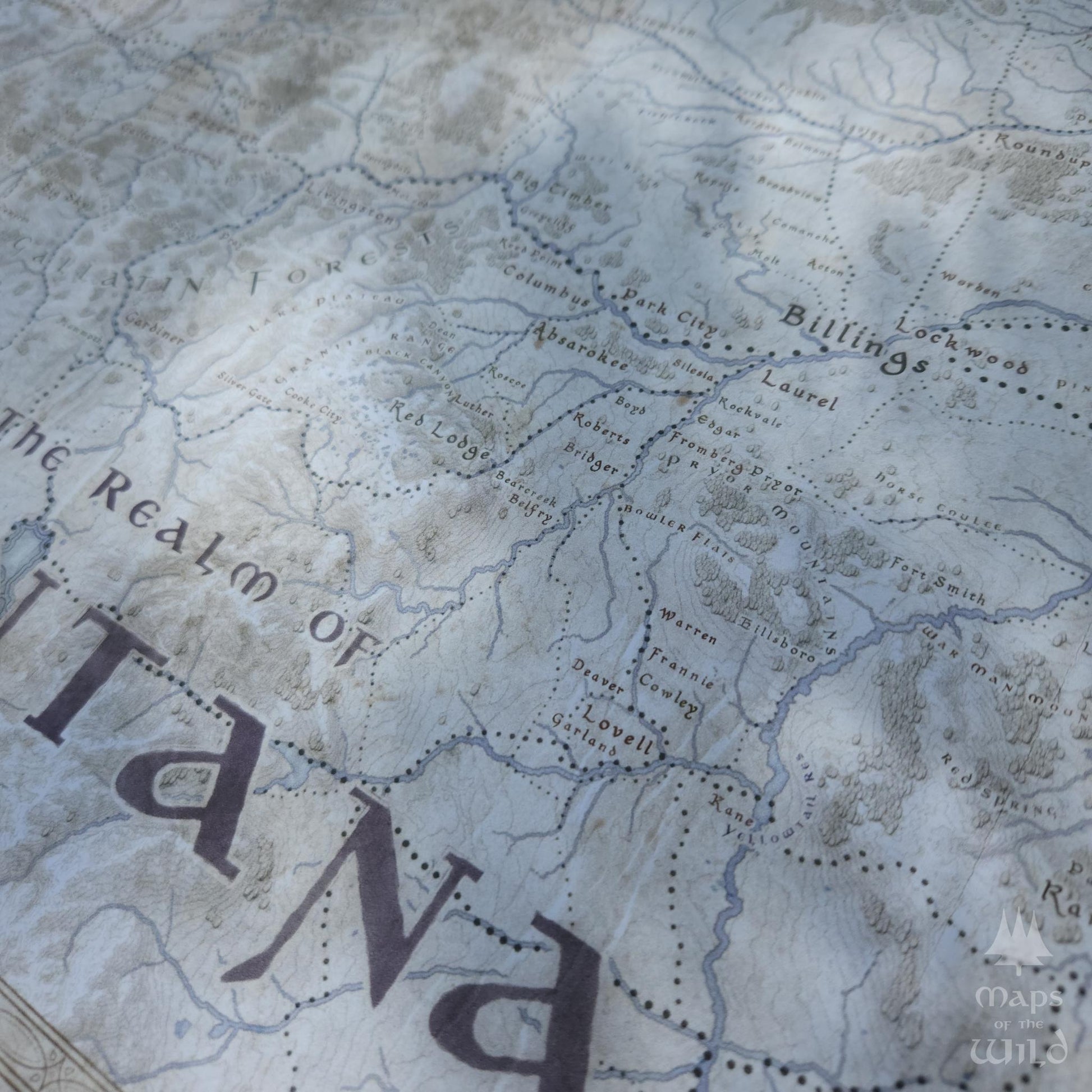 Montana wall map done in fantasy art style for home and office decor.