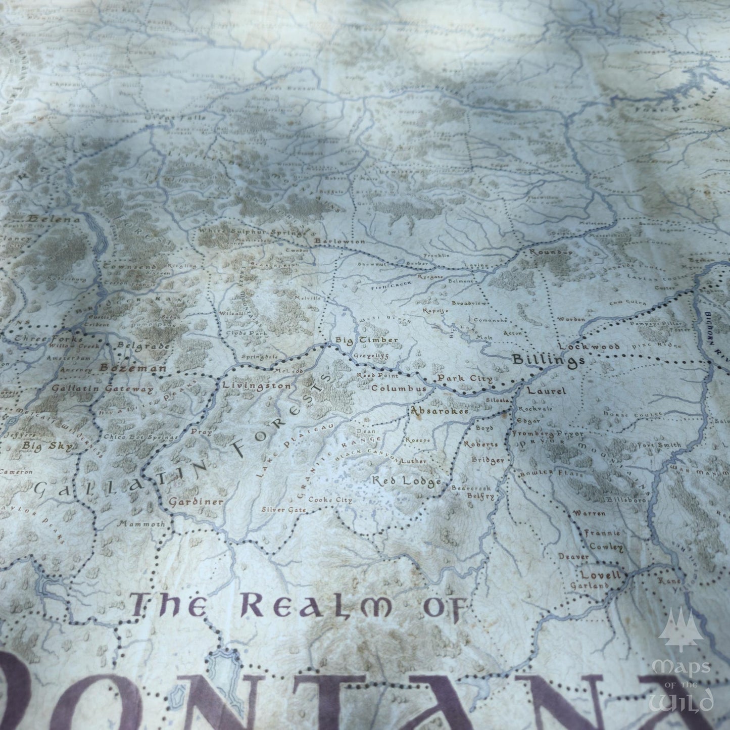 Montana wall map done in fantasy art style for home and office decor.