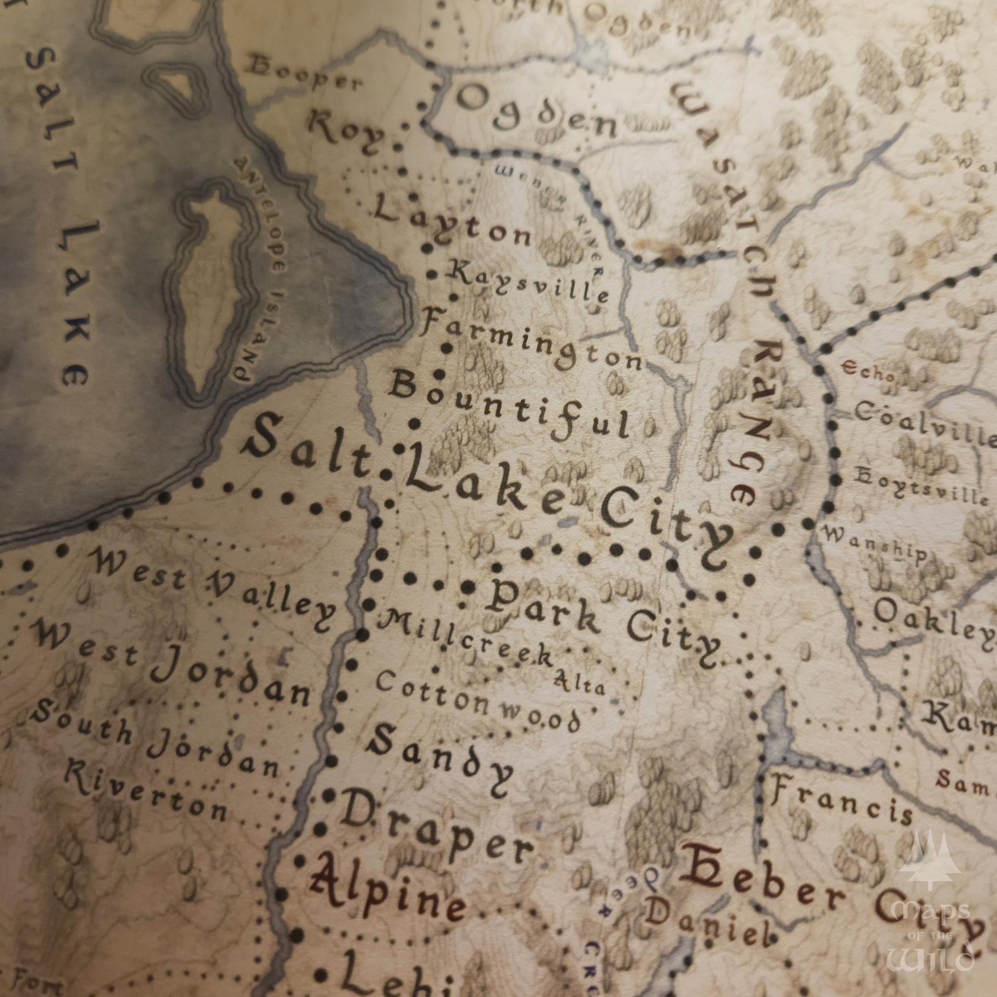 Utah wall map done in fantasy art style for home and office decor.