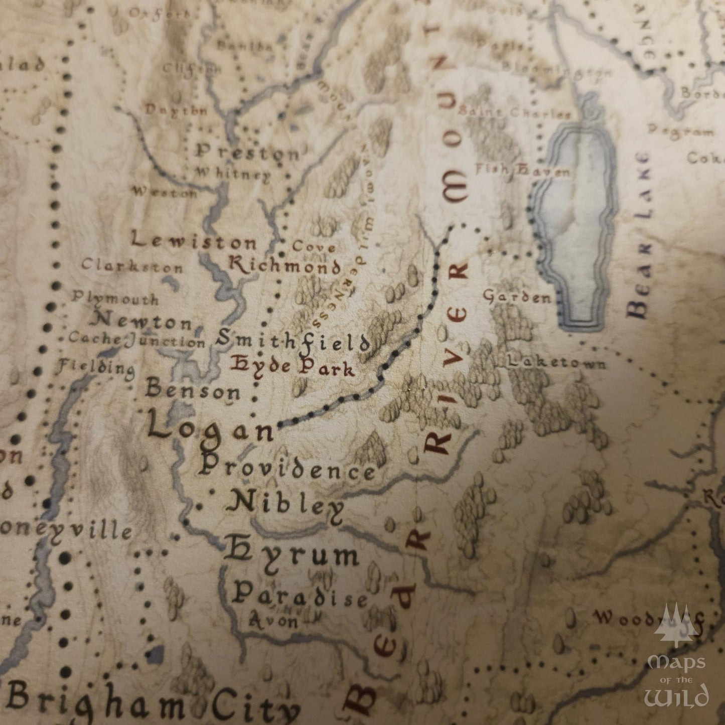 Utah wall map done in fantasy art style for home and office decor.